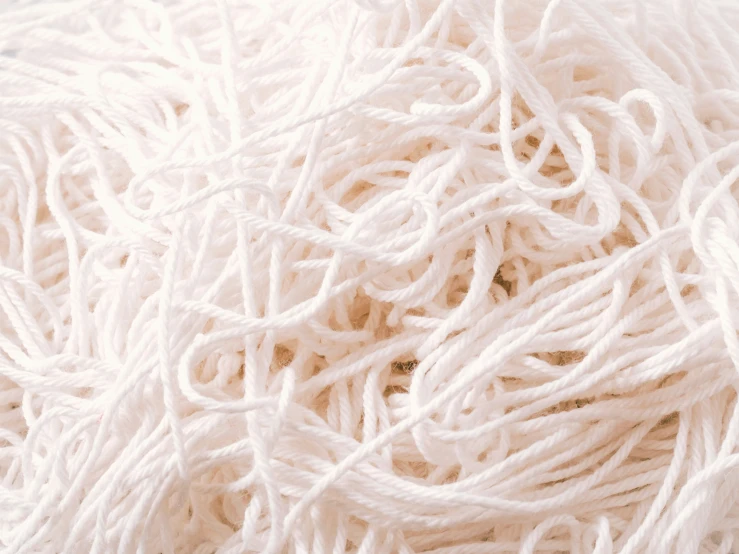 yarn for knitting on a white tablecloth