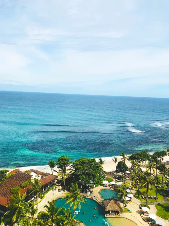 a view of a el with swimming pool next to the ocean