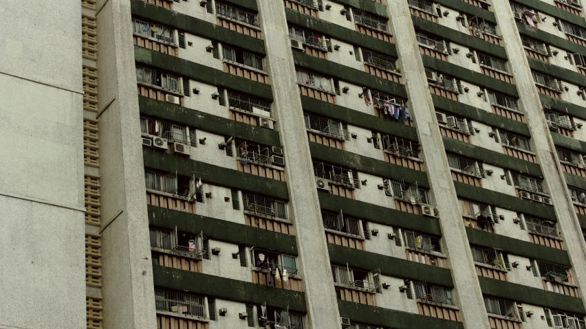 the top half of a building with lots of windows