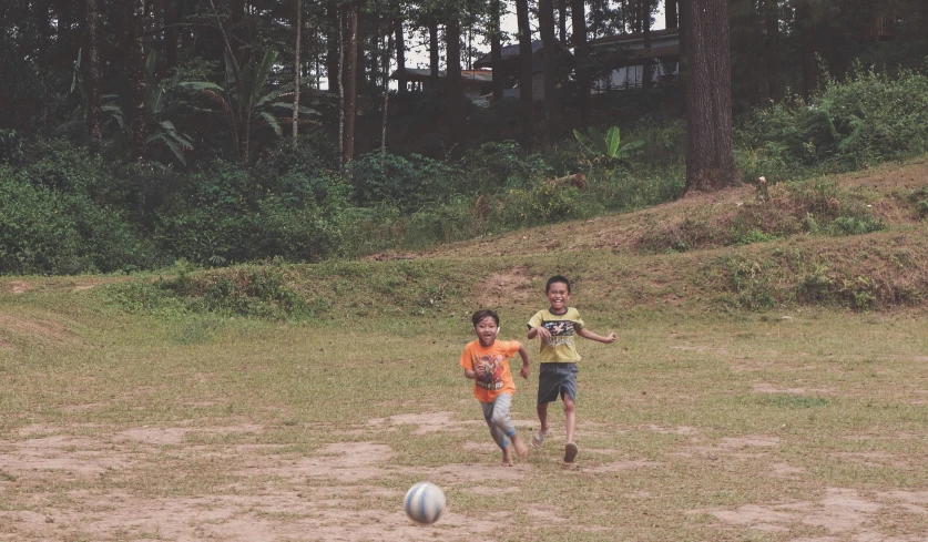 a couple of s play a game of soccer