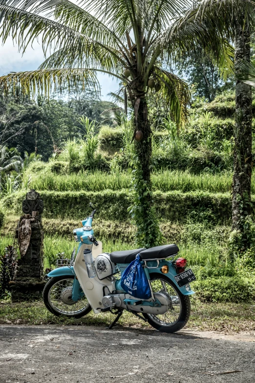 there is a motorcycle that is parked near a sign