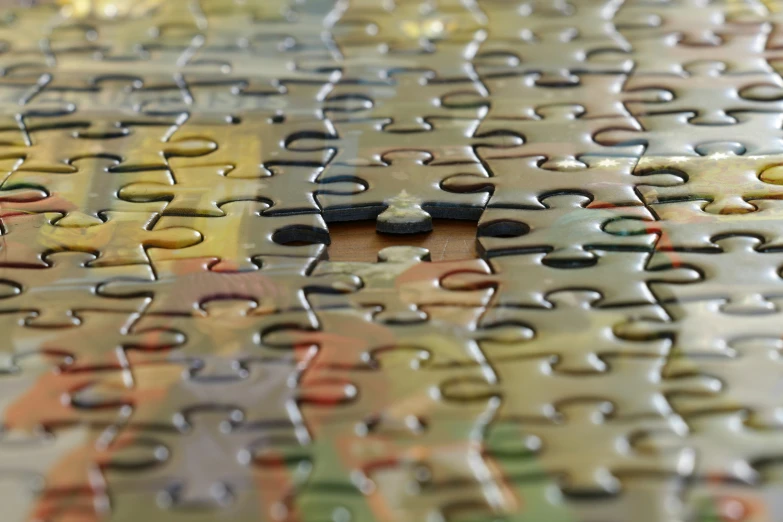 a puzzle pieces showing a missing piece,