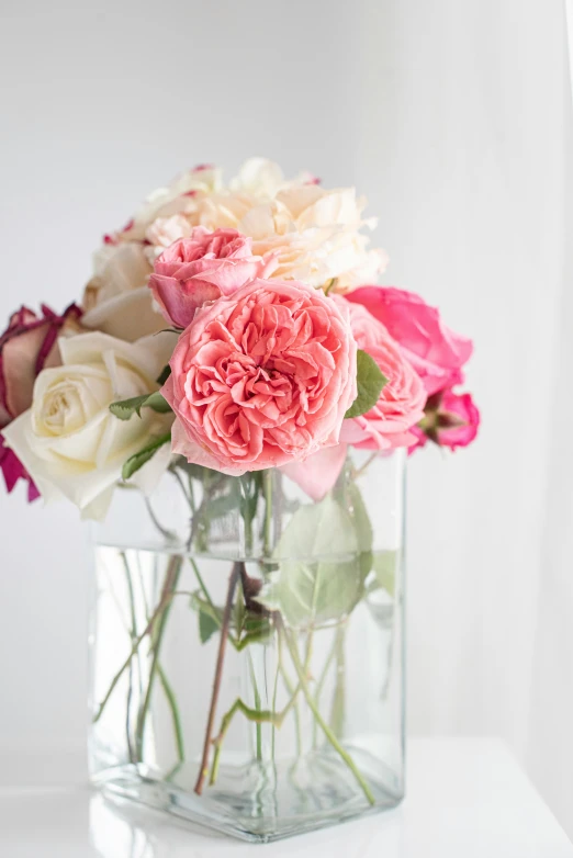 the flowers are arranged in a vase with water