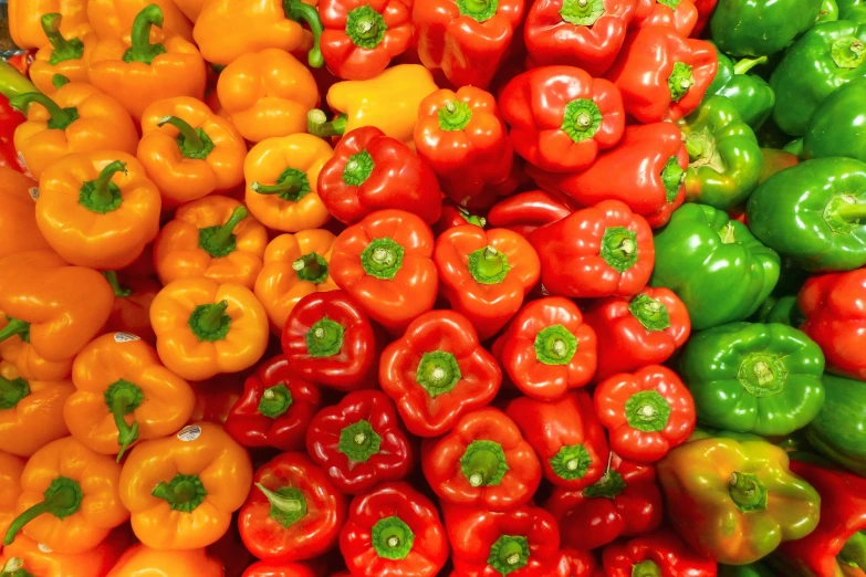 an assortment of brightly colored peppers