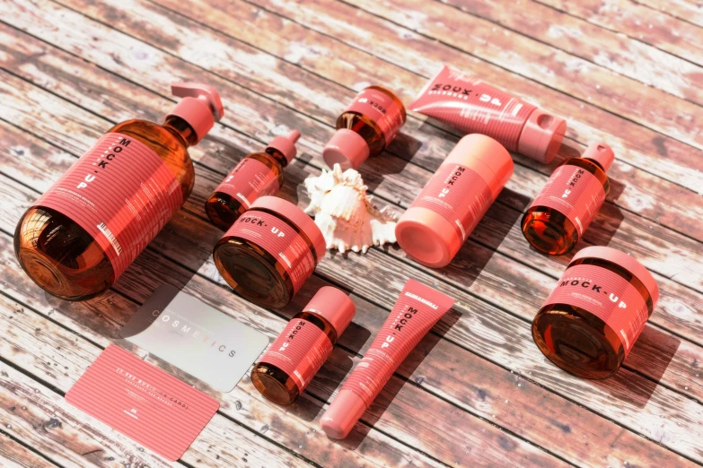 a wooden table topped with different types of bottles and bottles