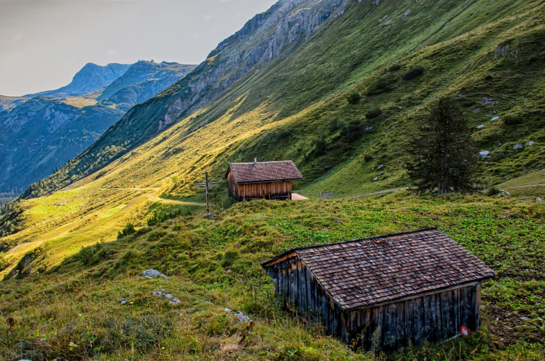 small buildings on the side of a mountain