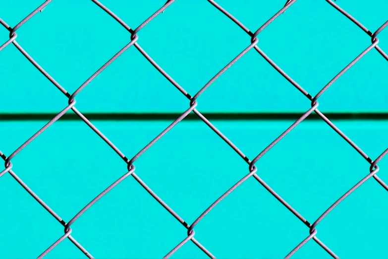 a close up of a chain link fence