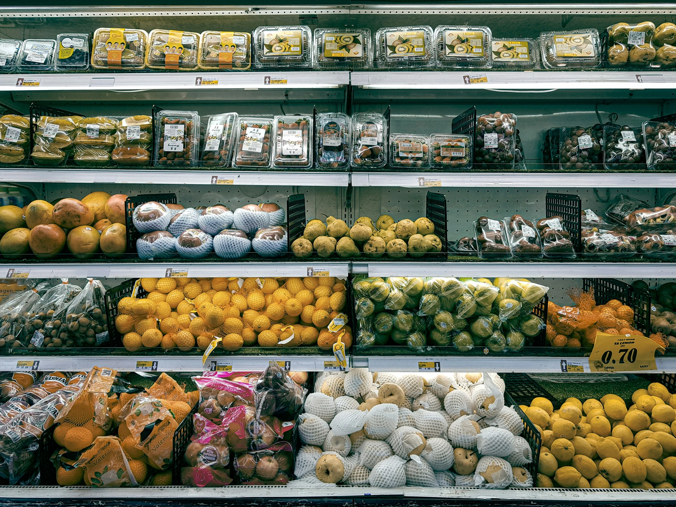 the display of fruits and veggies in a supermarket