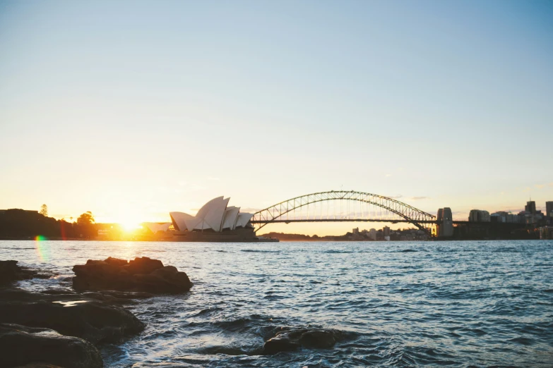 a very pretty view of a bridge over some water