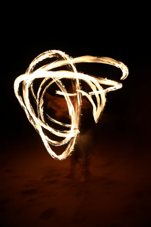 a close up s of fire spinning in the air