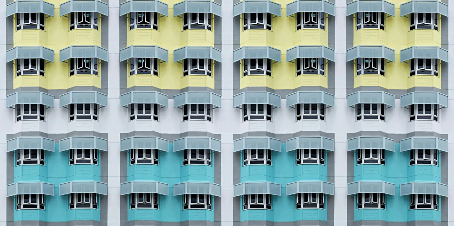 some blue yellow and white windows buildings and light