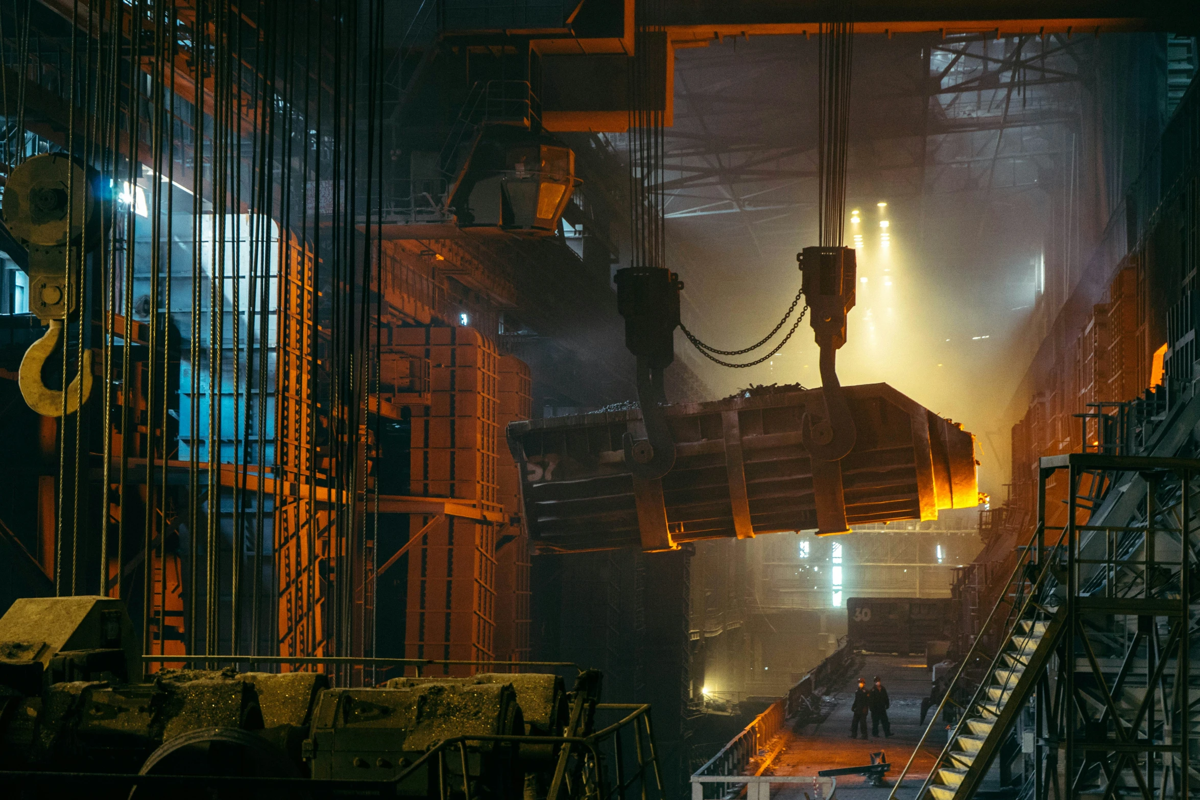 several large industrial machinery at night time