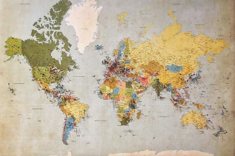 a world map drawn on old paper with an unreached background