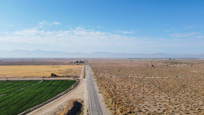 a wide open road in the middle of nowhere