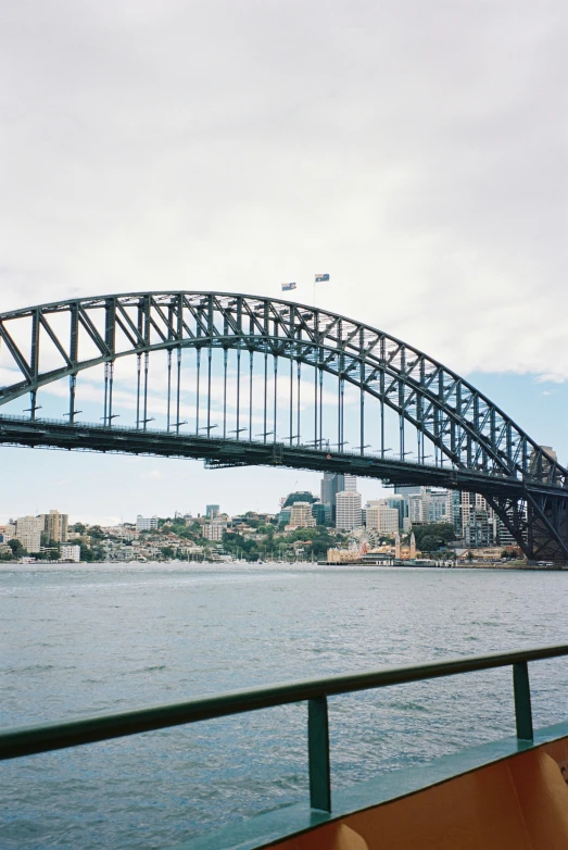 there is a large metal bridge over the water