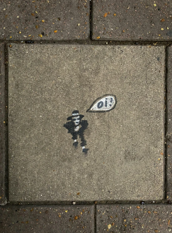 a street scene with a tennis racket laying on the ground