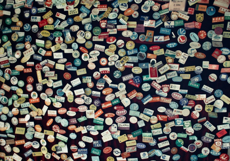 a group of paper tags attached to a wall