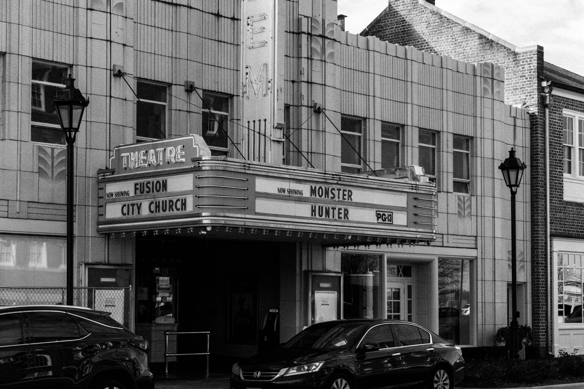 a building that has a movie theater in the front