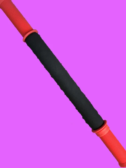 a black and red pencil with black handle on it