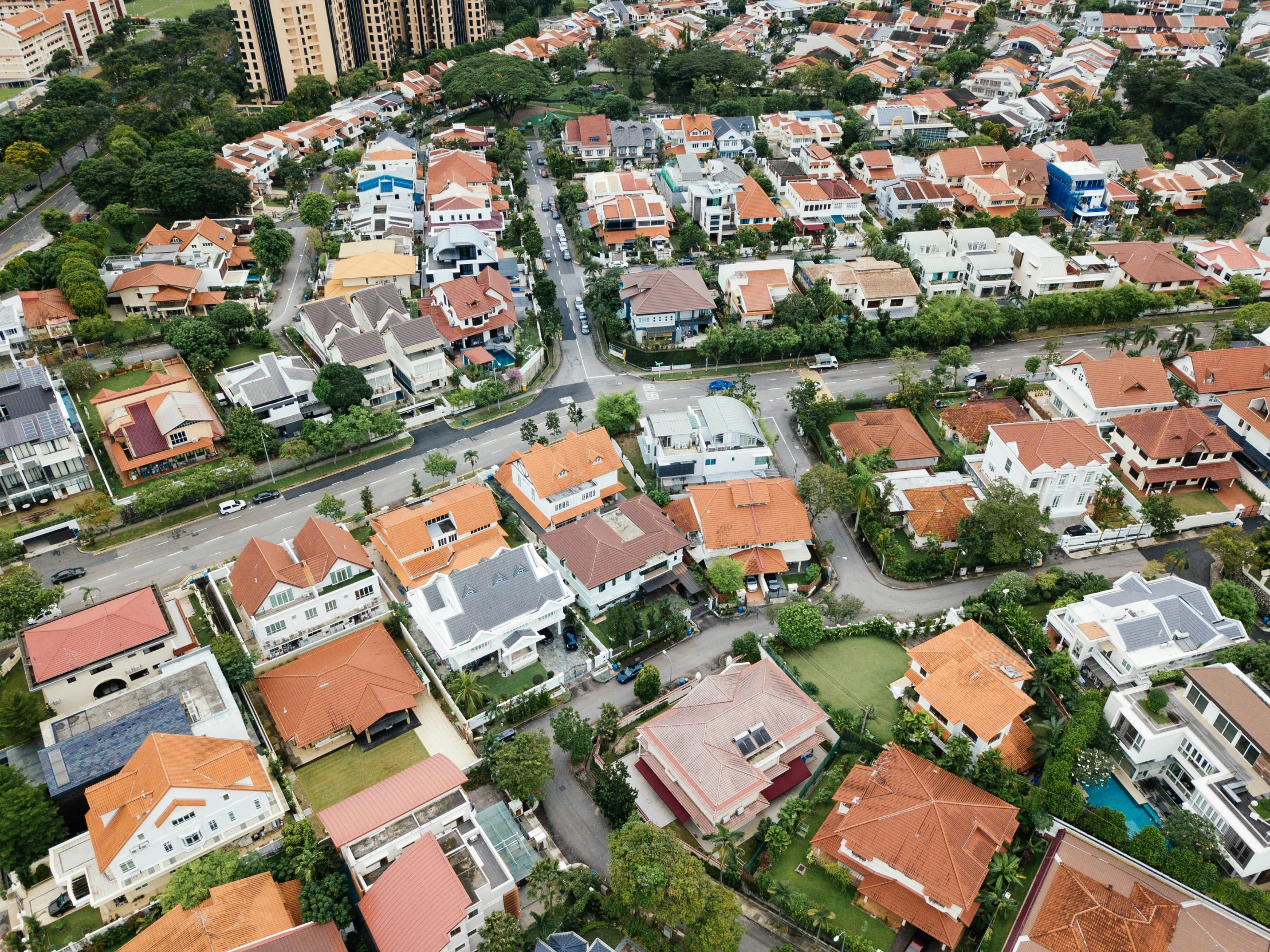 an aerial view of a neighborhood with buildings and streets