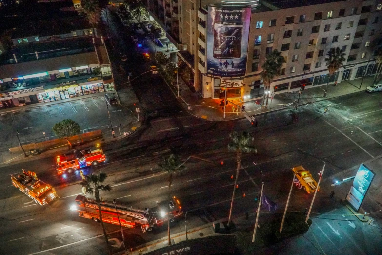 a city street is very dark, in the evening time