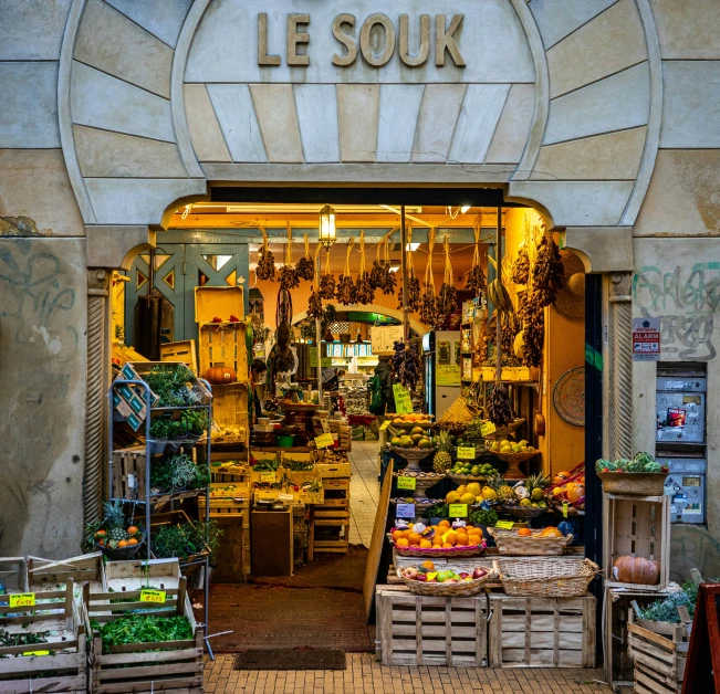 the front entrance of a store with fresh produce