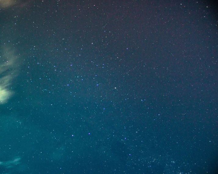 a view of some stars from a plane at night