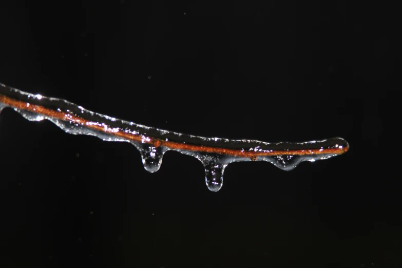 a  tube with water dripping out of it