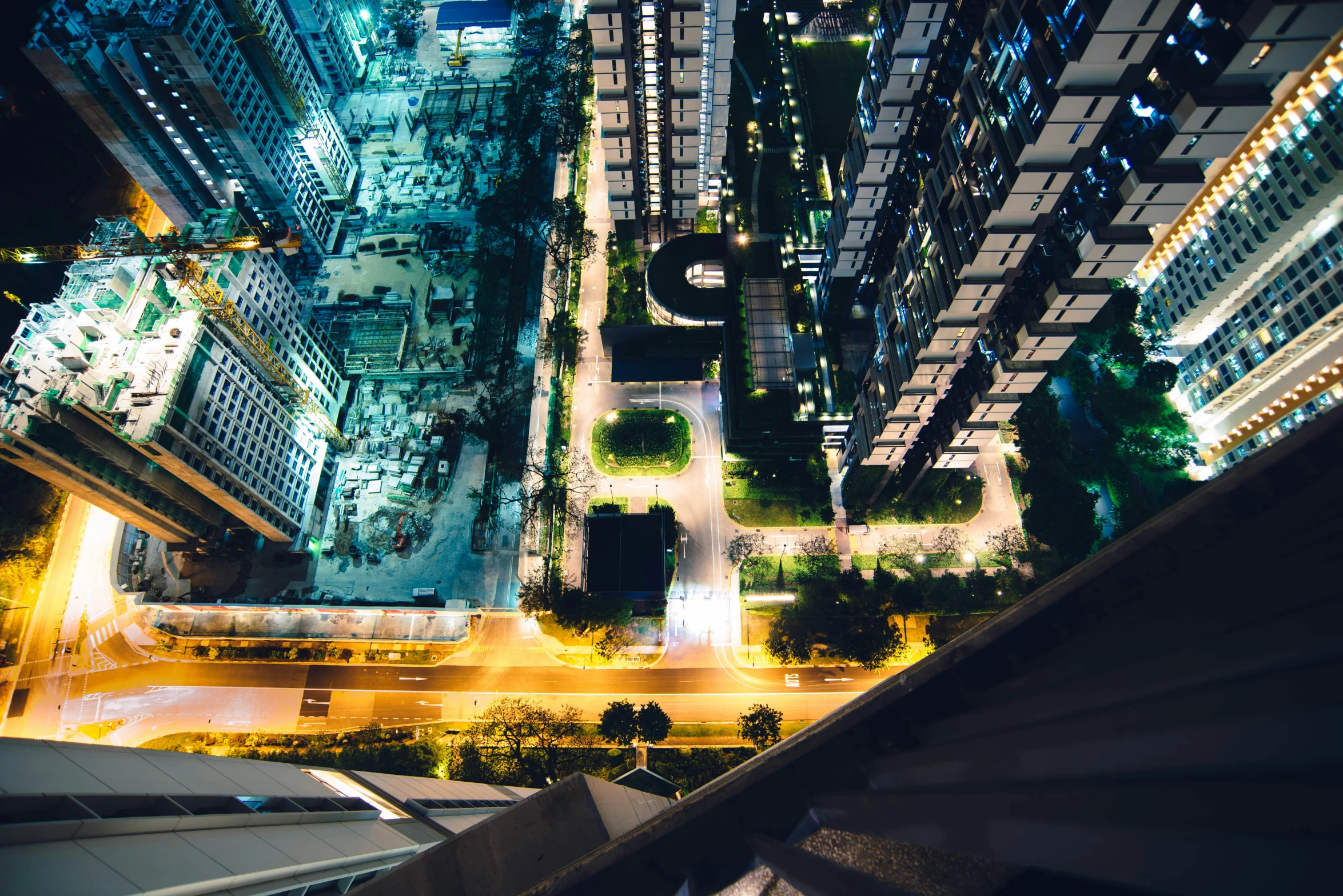 an overhead view of a city at night