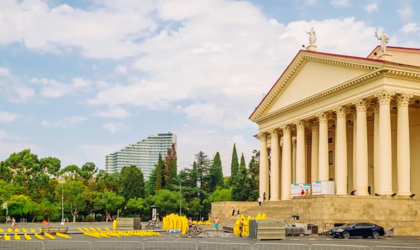 a stone building with columns and columns on it