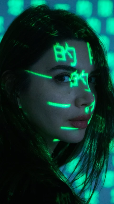 a woman is looking into the camera with glow painted on her face