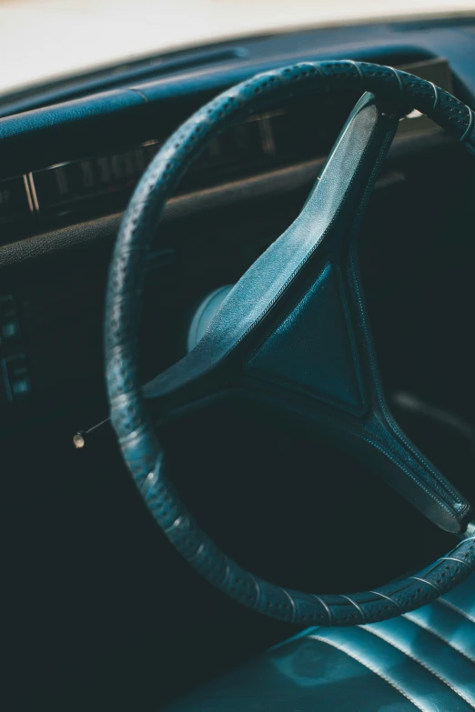 a black car with the front view steering wheel