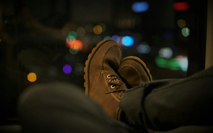 the boots are lit up in a city at night