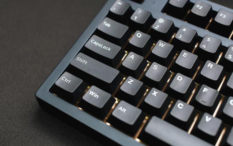 a black keyboard with several different keys and numbers