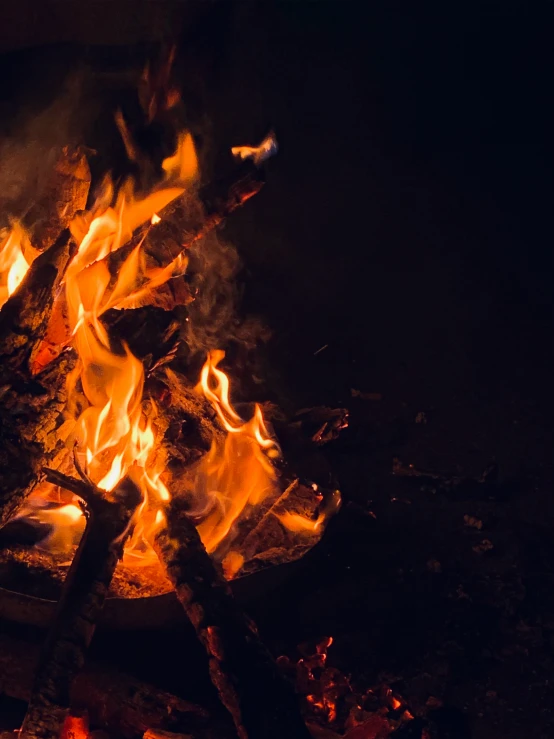 a bunch of burners and sticks next to some dark