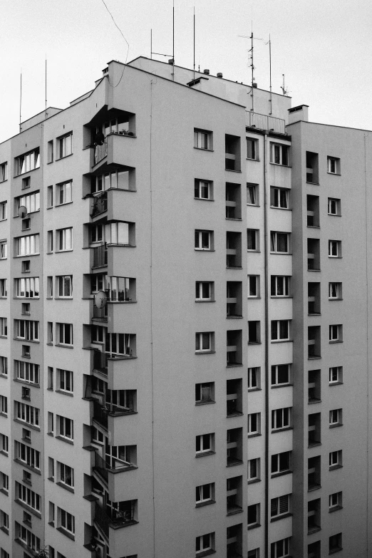 a view of some very tall buildings that have windows