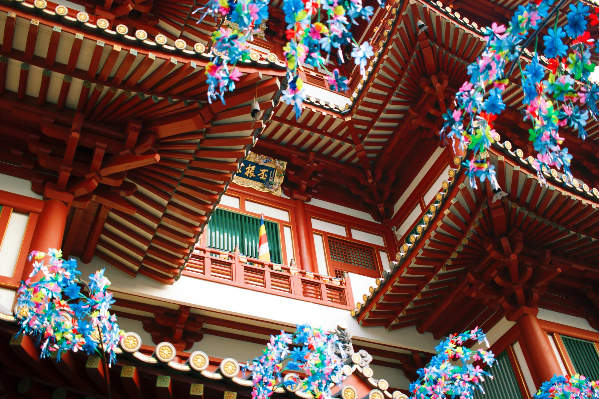 an image of decorations at a temple with building facade