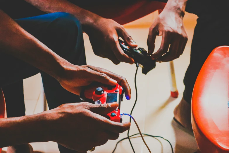 three people doing various crafts together holding scissors