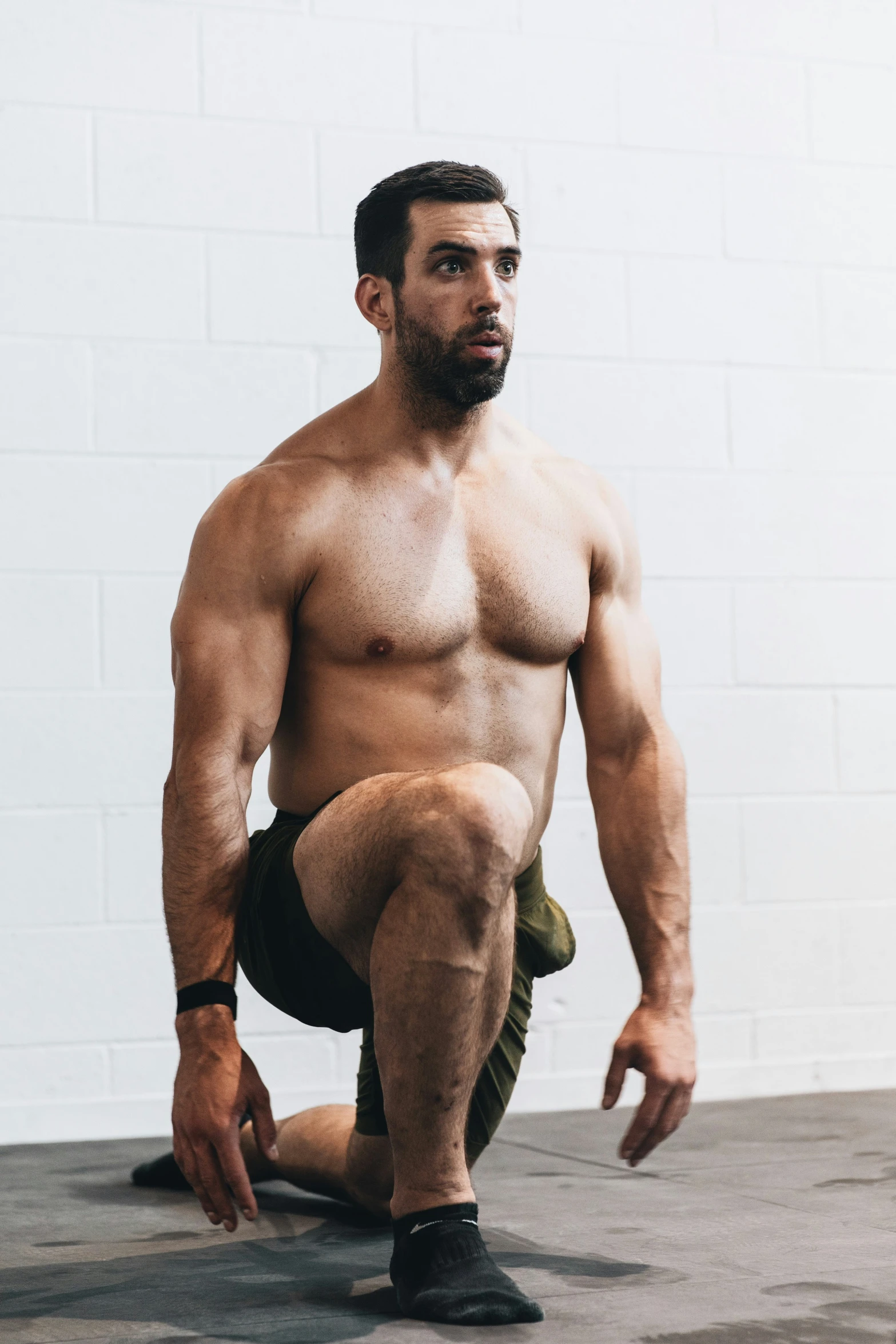 man squats for squat h up during crossfit