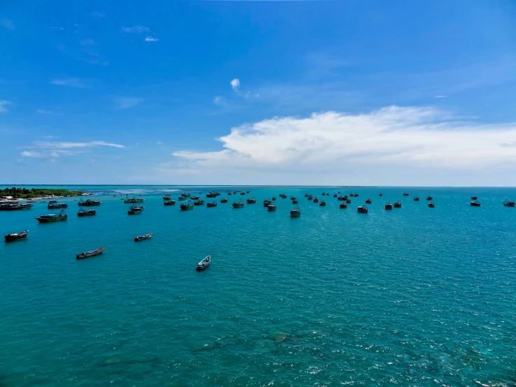 several boats are out on the open water