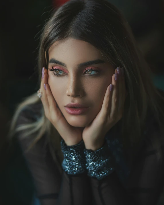 young woman with multicolored eyes poses for a portrait