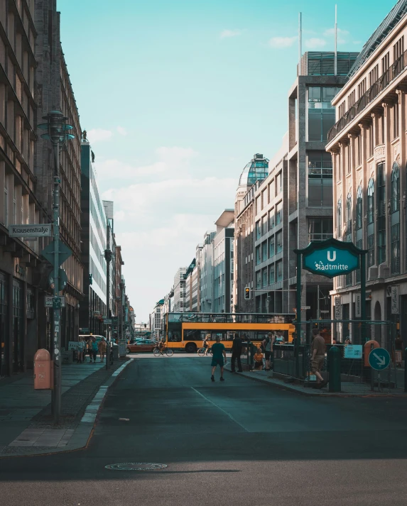 there is a bus that is in the street