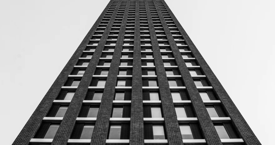 black and white s of the side of a tall building