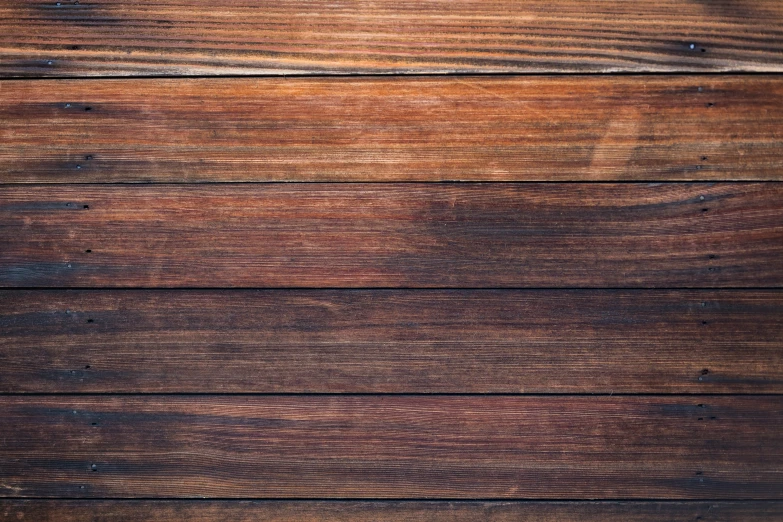 a wood texture background of brown colored wooden boards