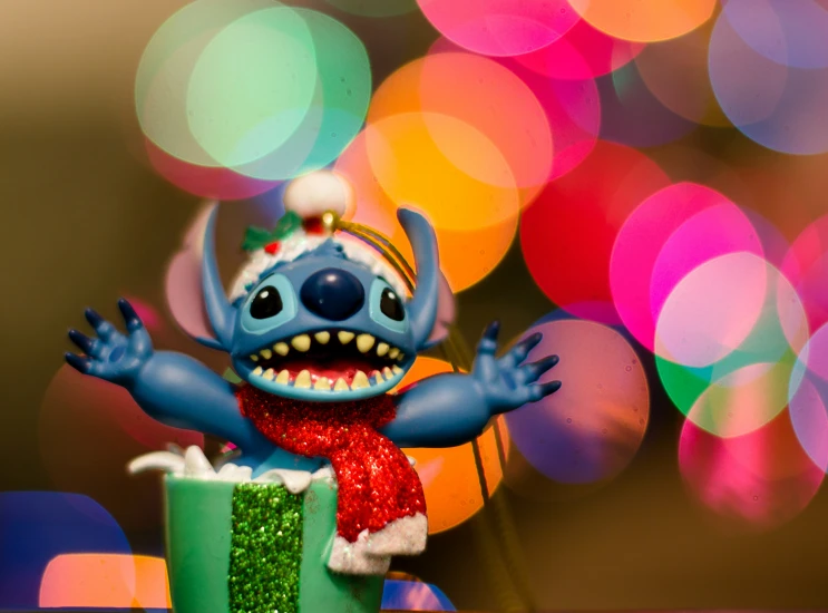 a small toy figure is posed with bright lights