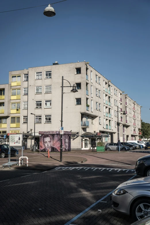 a street view with a building in the background