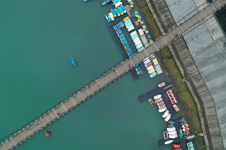 a body of water with boats docked to the shore