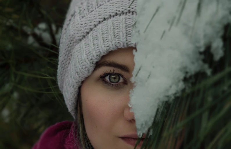 an image of a person hiding behind snow