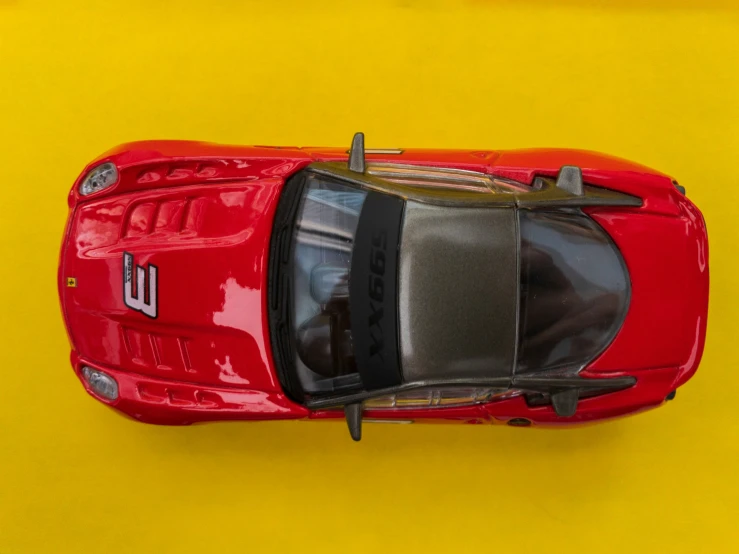 an overhead view of the roof of a red sports car