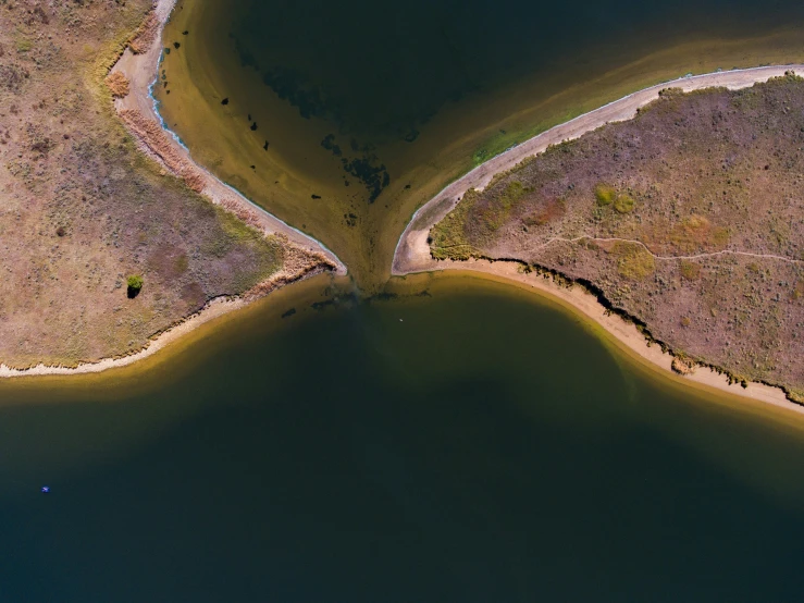 two water channels divide the land from the surrounding land